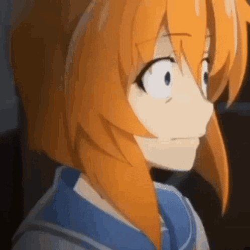 A Close Up Of A Person With Orange Hair And Blue Eyes . GIF