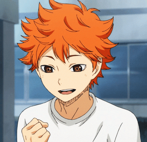 A Close Up Of A Person With Orange Hair And Brown Eyes GIF