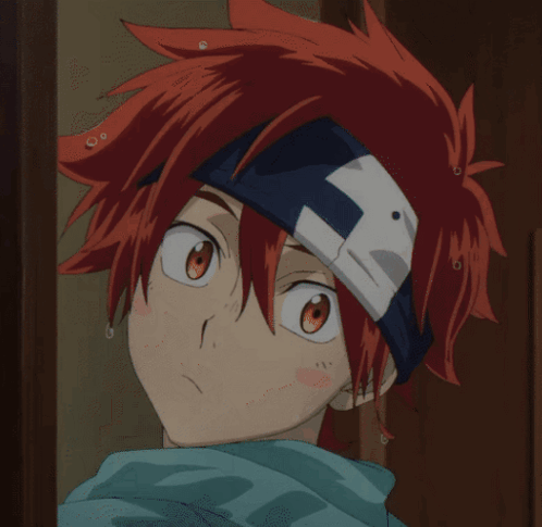A Close Up Of A Person With Red Hair And A Bandage On Their Head GIF