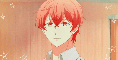 A Close Up Of A Person With Red Hair And White Stars GIF