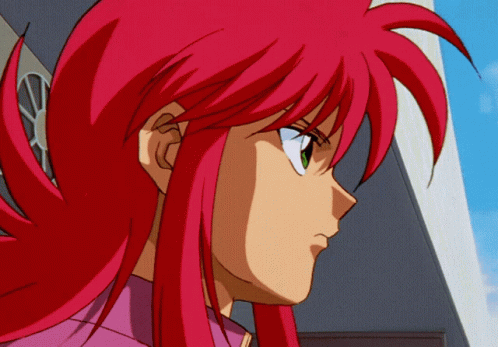 A Close Up Of A Person With Red Hair GIF