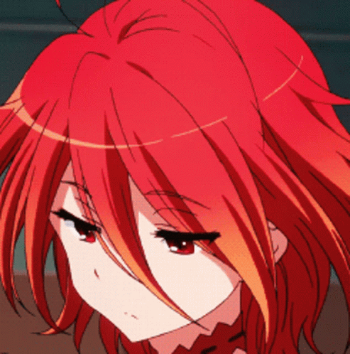 A Close Up Of A Person With Red Hair GIF