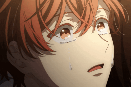 A Close Up Of A Person With Tears Running Down Their Face GIF