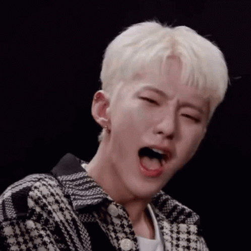 A Close Up Of A Person With Their Mouth Open And Their Tongue Out . GIF