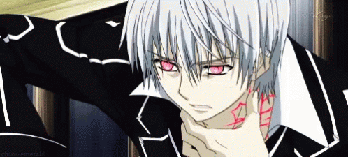 A Close Up Of A Person With White Hair And Red Eyes GIF