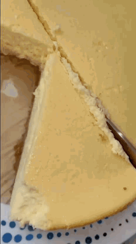 A Close Up Of A Piece Of Cake On A Plate GIF