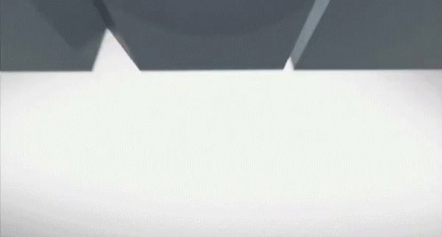 a close up of a piece of metal that looks like a shark