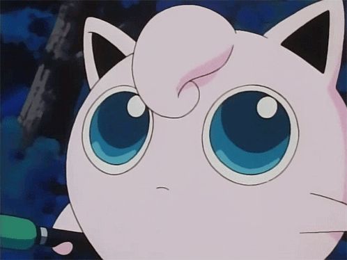 A Close Up Of A Pink Cat With Blue Eyes GIF