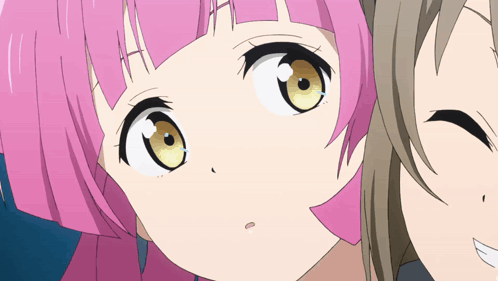 A Close Up Of A Pink Haired Anime Character GIF