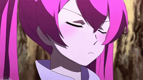 A Close Up Of A Pink Haired Anime Girl With Her Eyes Closed And A Serious Look On Her Face . GIF