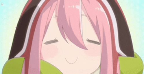 A Close Up Of A Pink Haired Anime Girl With Her Eyes Closed GIF