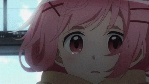A Close Up Of A Pink Haired Anime Girl With Tears Coming Out Of Her Eyes . GIF