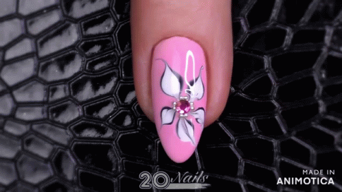 A Close Up Of A Pink Nail With A Flower Design Made In Animatica GIF