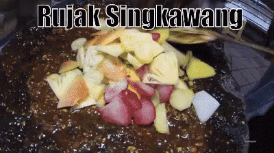 A Close Up Of A Plate Of Food With The Words Rujak Singkawang Above It GIF