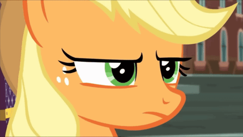 A Close Up Of A Pony 'S Face With A Sad Look On Her Face GIF