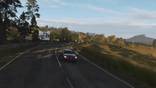 A Close Up Of A Red Car 'S Tail Light That Says ' J ' On It GIF