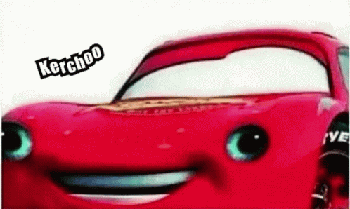 A Close Up Of A Red Car With A Smiling Face And The Words Kerchoo On It . GIF