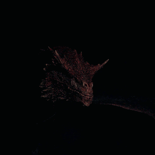A Close Up Of A Red Dragon 'S Head With A Black Background GIF