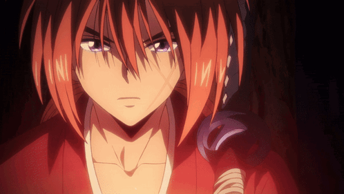A Close Up Of A Red Haired Anime Character With A Sword GIF