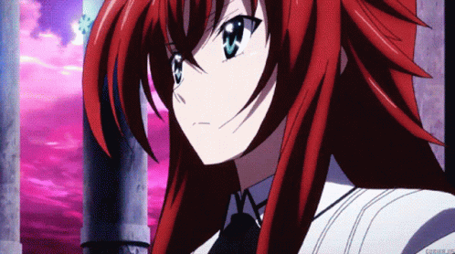 A Close Up Of A Red Haired Anime Girl With A Purple Sky Behind Her GIF