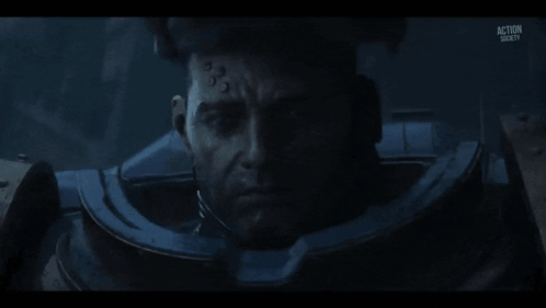 A Close Up Of A Robot 'S Face With Red Eyes And The Words Action Gear On The Bottom GIF