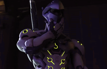 A Close Up Of A Robot With A Green Light On His Face . GIF