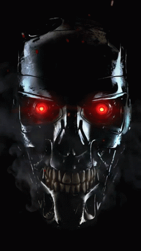 A Close Up Of A Skull With Red Eyes On A Black Background GIF