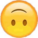 a close up of a smiley face with a slight smile on it .