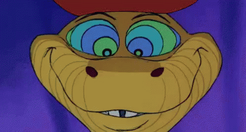 A Close Up Of A Snake 'S Face With Hypnotic Eyes GIF