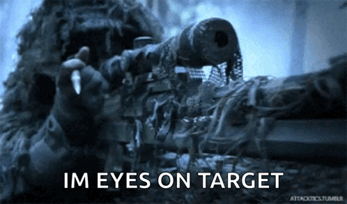A Close Up Of A Sniper With The Words Im Eyes On Target Behind Him GIF
