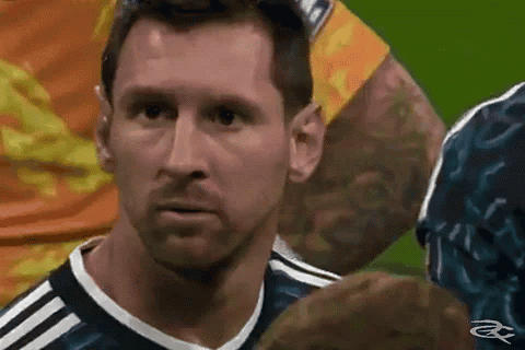 A Close Up Of A Soccer Player 'S Face Looking At The Camera GIF