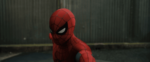A Close Up Of A Spider Man In A Red Suit GIF
