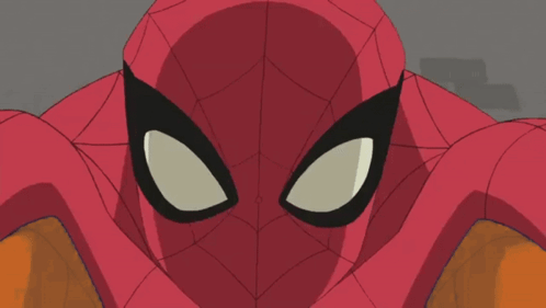 A Close Up Of A Spider Man 'S Face GIF
