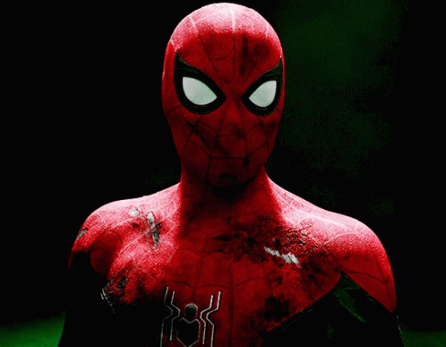a close up of a spider man 's face with a black background