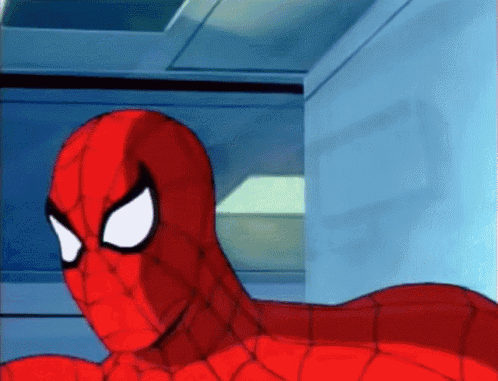 A Close Up Of A Spider Man 'S Face With A Blue Background GIF