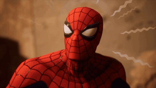 A Close Up Of A Spider Man 'S Face With A Spider Web On It GIF