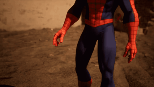 A Close Up Of A Spider Man 'S Legs And Hands GIF