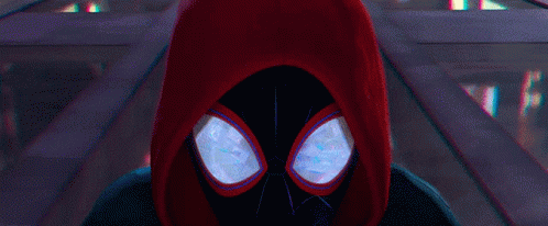 A Close Up Of A Spider Man With A Red Hood GIF