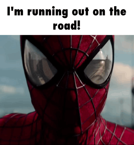 A Close Up Of A Spider Man With The Words " I 'M Running Out On The Road " Above Him GIF