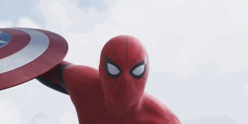 A Close Up Of A Spiderman Holding A Captain America Shield In His Hand . GIF
