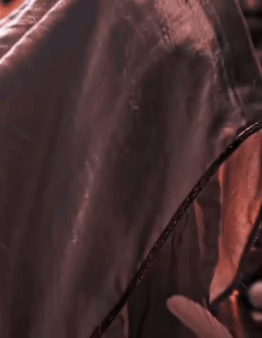 Close Up Of Man's Face With White Hat Statue GIF