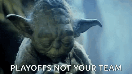 A Close Up Of A Statue Of Yoda With The Words Playoffs Not Your Team Written Below Him . GIF