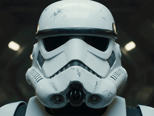 A Close Up Of A Storm Trooper Helmet With A Black Stripe GIF