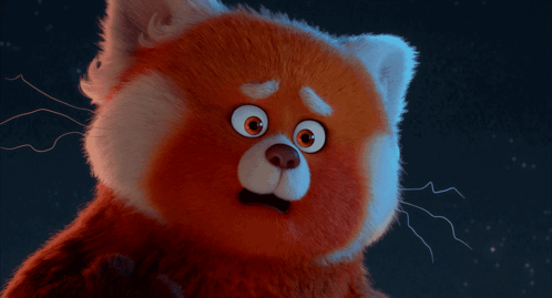A Close Up Of A Stuffed Animal With A Surprised Look On His Face GIF