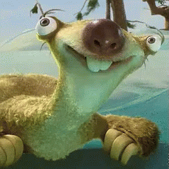 A Close Up Of A Stuffed Animal With Big Eyes And A Smile On Its Face GIF