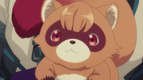 A Close Up Of A Stuffed Animal With Red Eyes And A White Nose GIF