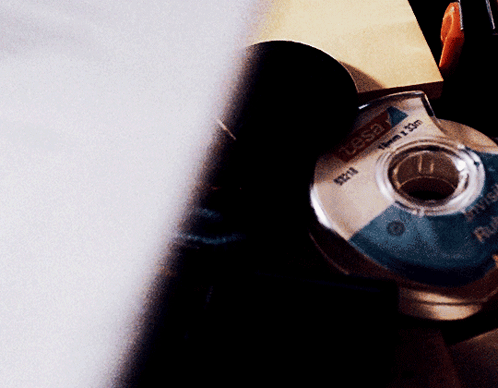 A Close Up Of A Tesa Tape Roll GIF