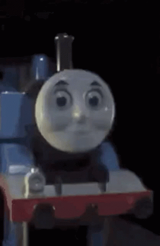 A Close Up Of A Thomas The Tank Engine With A Sad Face . GIF