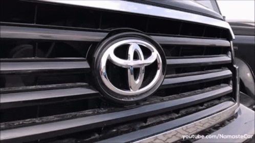A Close Up Of A Toyota Logo On The Front Of A Vehicle GIF