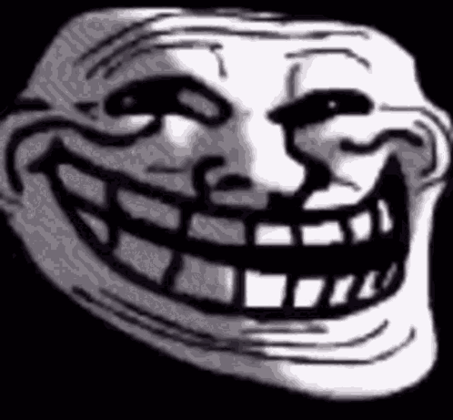 A Close Up Of A Troll Face With A Big Smile On It . GIF